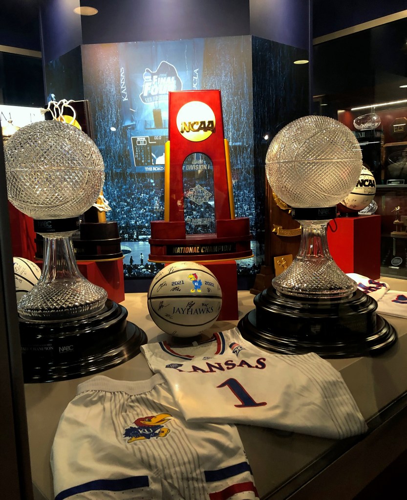 Altered version of a photo I took on April 1, 2023, at Allen Fieldhouse. This photo has been lightened, and a new logo has been placed on the ball.